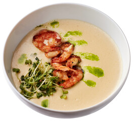 Creamy cheese soup with grilled shrimps