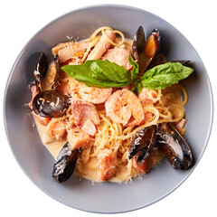 Seafood pasta with mussels, squid, salmon, prawns