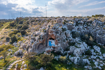 Fototapeta premium Christian orthodox cave church. Agioi Saranta holy chapel Protaras Cyprus from drone view