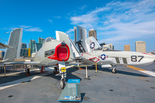 San Diego, United States - JULY 2018: FJ-3 Fury and Grumman F9F - 8P Cougar, American Fighter aircraft of 1950s in USS Midway Battleship Aviation museum. American aircraft served in Vietnam War.