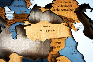 Turkey on a wooden world political map on a wall.