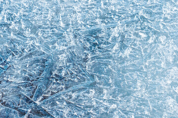 Natural river ice background, closeup. Blue texture of the pieces of ice. Blue ice abstract natural background