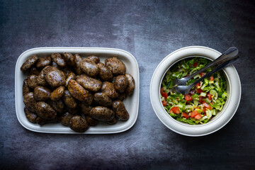 Mombar in ِArabic or what is also called Fawaregh is simply stuffed sheep sausages with rice and hummus