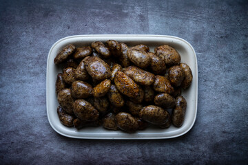 Mombar in ِArabic or what is also called Fawaregh is simply stuffed sheep sausages with rice and hummus