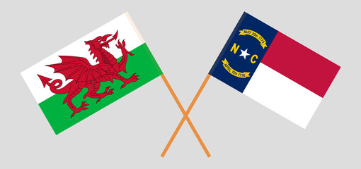 Crossed flags of Wales and The State of North Carolina. Official colors. Correct proportion