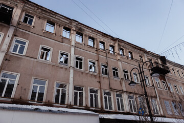 Fototapeta na wymiar Destroyed residential building. Consequences of war or fire concept