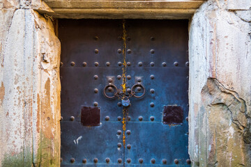 Door of old building with padlock