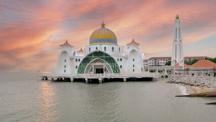 Famous straits floating Mosque near the sea at sunset.