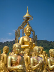 Fototapeta premium The golden Buddha statue was built outdoors. It is a symbol of the Wednesday religion.