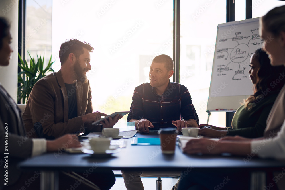 Aufkleber i think we should stick to basics. shot of a group of motivated business people having a meeting and