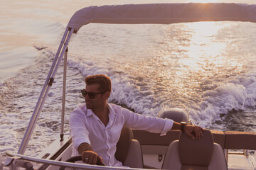A determined senior businessman in casual clothes and sunglasses enjoys his vacation driving a...