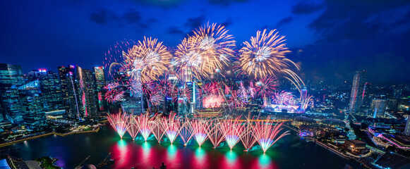 Banner image of fireworks with Singapore city view at night.
