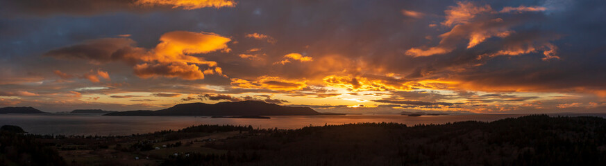 Aerial Panoramic View of Orcas Island During a Dramatic Sunset. Seen from neighboring Lummi island...