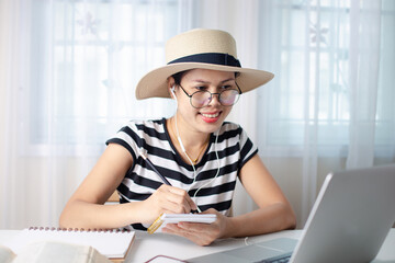 Asian woman influencer in the office of his home