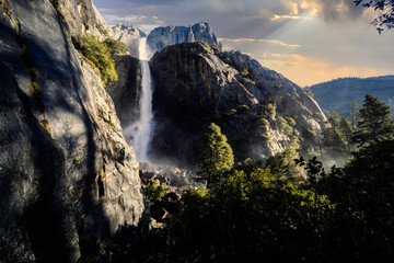 Mysterious waterfall in the forest in Yosemite National Park, California.