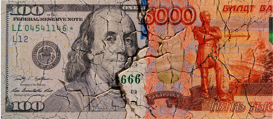 The crack between the US and Russian currencies. Symbol of financial conflict USA and Russia.