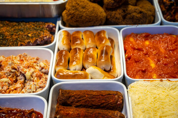 Assortment of gourmet meat dishes in butchery delicatessen shop