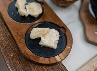Tasting of different matured and old parmesan Parmigiano-Reggiano hard cheese in Parma, Emilia Romagna, Italy