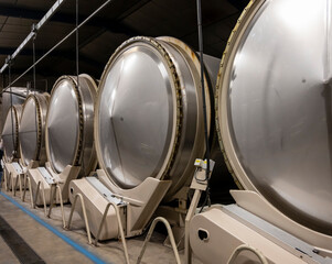 Production of sweet cassis creme liquor from ripe black currant berries, distillation and maceration in steel tanks,  Burgundy, France