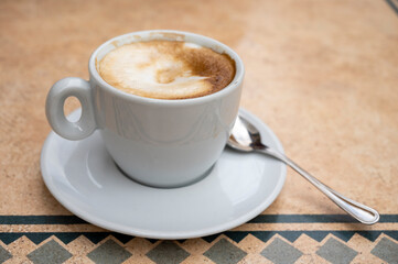 Fresh brewed coffee cappuccino in italian bar, morning coffee