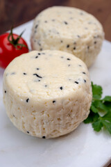 Traditional polish white cheese with black chives seeds made in North Poland in Kaszebe area near...