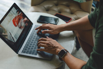 closeup hands of businessman working at office, Man typing keyboard on laptop or computer.