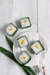 Kue tako or kuih tako nangka, Indonesian traditional sweet dessert topping with jackfruit slice.