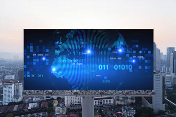 Glowing hologram of Earth planet map on billboard over aerial panoramic cityscape of Kuala Lumpur...