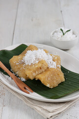 Getuk telo is a traditional food from Central Java, Indonesia. Getuk made from mashed cassava and covered with grated coconut.