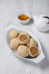 Mochi kacang or Injeolmi, Korean traditional rice cake made from the glutinous rice with peanuts filling and coated with soybean flour.