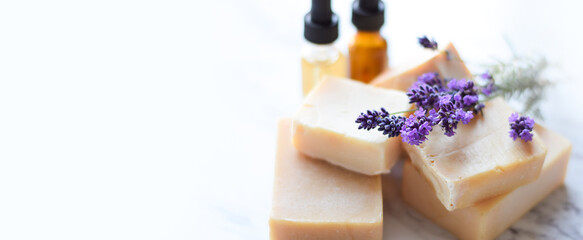 Handmade soap bars, essential oils with fresh lavender flowers web banner