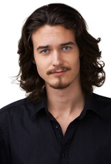 Giving you that dreamy smile. Handsome young man with shoulder-length hair and a goatee smiling at the camera.