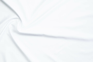 White fabric texture that is white cloth surface background with beautiful soft blur pattern.