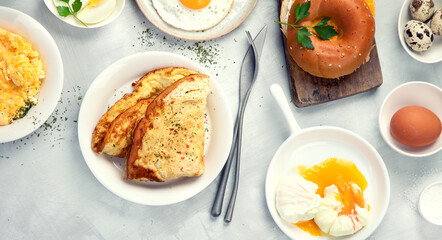 Various ways of cooking chicken eggs on light background.