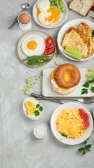 Various ways of cooking chicken eggs on light background.