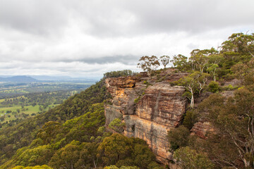 Fototapeta na wymiar Photograph of a large green valley and hills in regional Australia.