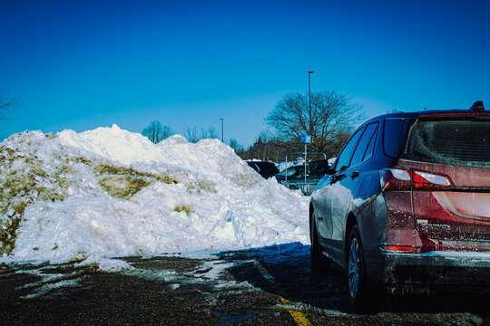 Middlefield, Ohio, USA - 2-6-22:  The after effects of a heavy snowstorm in a parking lot