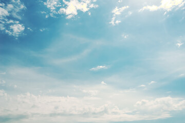 Obraz premium Blue sky, white clouds with yellow spots