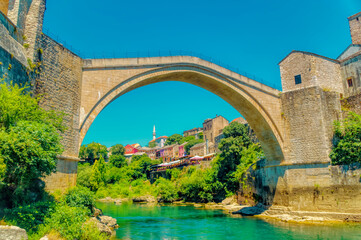 Fototapeta na wymiar View over famous Old Bridge over river Neretva in Mostar, Bosnia and Herzegovina.