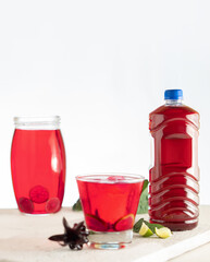 Roselle. Jamaica water packaged without label. White background. Copy space.