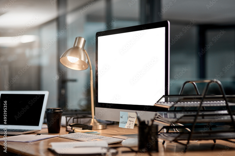 Poster build your perfect business with technology. cropped shot of an office workstation scattered with st