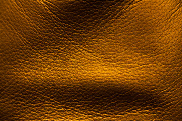 Gold color leather texture background.