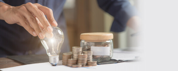 Close up hand choose light bulb or lamp for human resources or leadership and creativity thinking idea motivation or vision and knowledge learning and study or education concept.