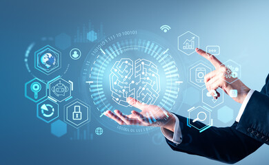 Businessman wearing formal suit is holding digital interface with hand