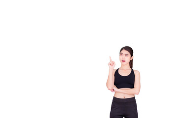 A Thai Southeast Asian woman wearing a black workout clothes and standing with her finger pointing up. isolated on a white background
