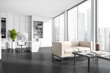 Corner view on office room interior with desktop, shelves, sofa