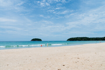 Tourist are carrying body board at Kata beach, Phuket, Thailand : The famous beach in Phuket, Thailand