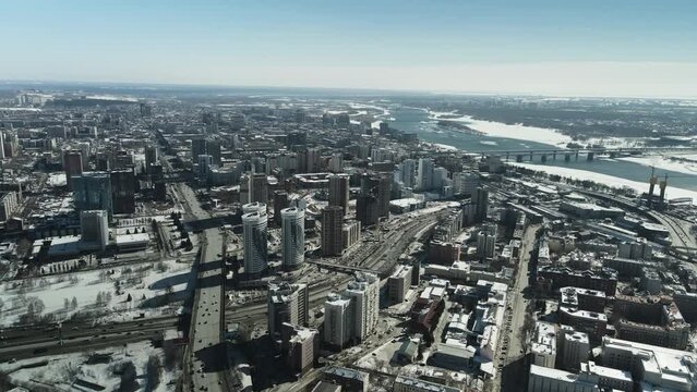 Big city in spring. Aerial photography in 4k. Spring city in Siberia.