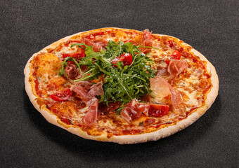 Pizza with parma and rucola