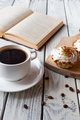 Delicious morning breakfast. Coffee with mint cakes on the background of an old white wooden countertop.